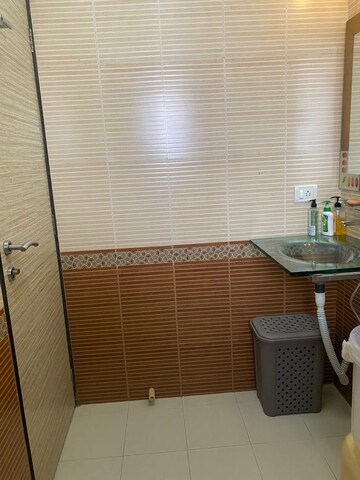 Bathroom in 3 BHK Apartment at Omkar Alta Monte, Malad East – for Rent