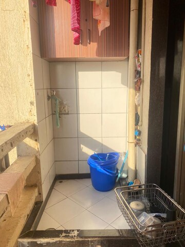 Bathroom in 3 BHK Apartment at Omkar Alta Monte, Malad East – for Rent