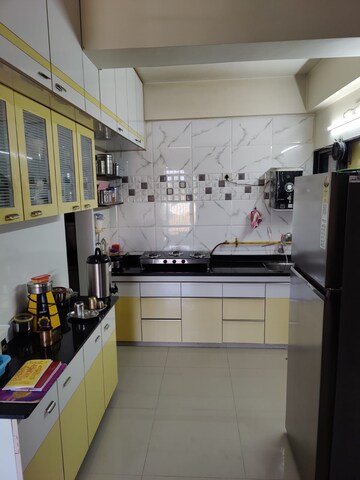 Kitchen in 2 BHK Apartment at Swastik Divine, Science City – for Sale