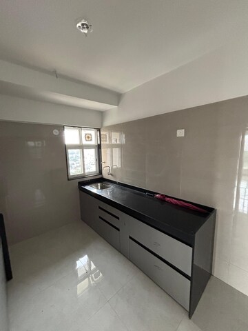 Kitchen in 2 BHK Apartment at Vaibhavlaxmi Queens Glory, Chembur – for Rent