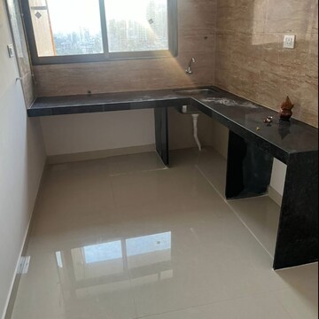Kitchen in 2 BHK Apartment at Aman CHS Malad East, Pathan Wadi – for Rent