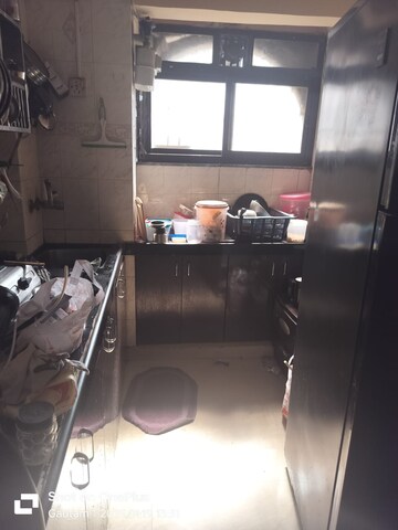 Kitchen in 1 BHK Apartment at Green Fields Apartment, Andheri East – for Rent