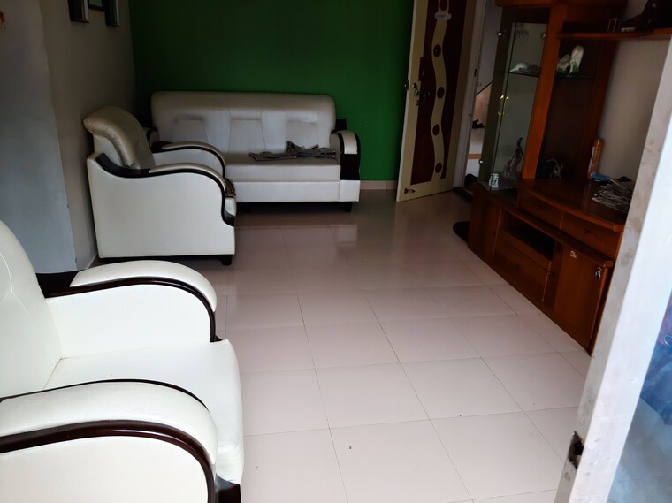 Living Room, nirmal-township-chs-b5-building 2 Bedroom 900 Sq.Ft. Apartment In Sinhagad Road Pune 9180447