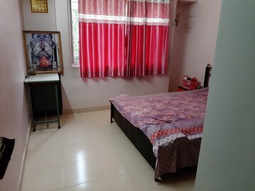 Bedroom in 2 BHK Apartment at Nirmal Township CHS B5 Building, Sinhagad Road – for Sale