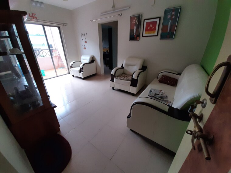 Living Room, nirmal-township-chs-b5-building 2 Bedroom 900 Sq.Ft. Apartment In Sinhagad Road Pune 9180447