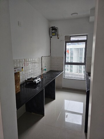 Kitchen in 2 BHK Apartment at Kalpataru Immensa, Kolshet Road – for Rent