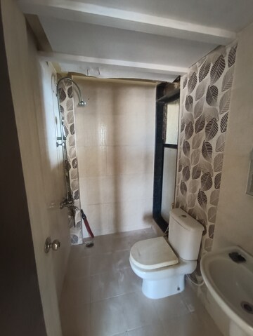 Bathroom in 1 BHK Apartment at Ajmera Yogi Dham Phase III, Kalyan West – for Rent