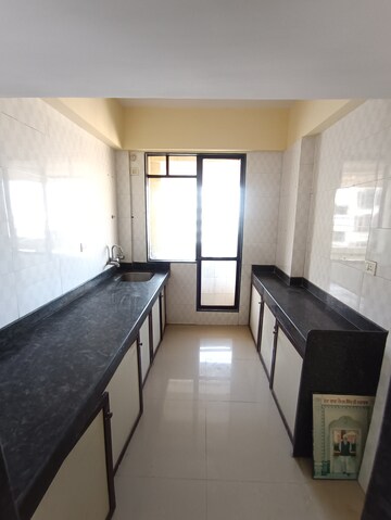 Kitchen in 1 BHK Apartment at Ajmera Yogi Dham Phase III, Kalyan West – for Rent
