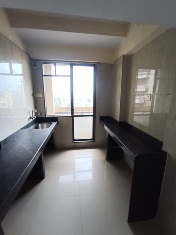 Kitchen in 2 BHK Apartment at Ajmera Yogi Dham Phase III, Kalyan West – for Rent