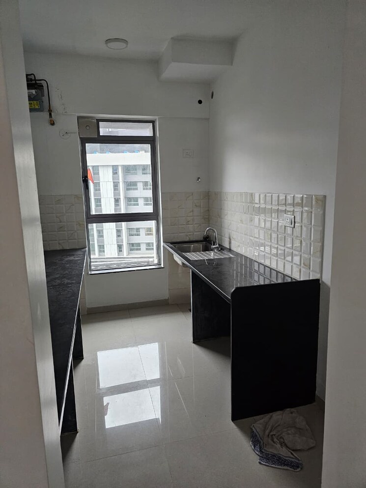 Kitchen, kalpataru-immensa 2 Bedroom 637 Sq.Ft. Apartment In Kolshet Road Thane 9180526