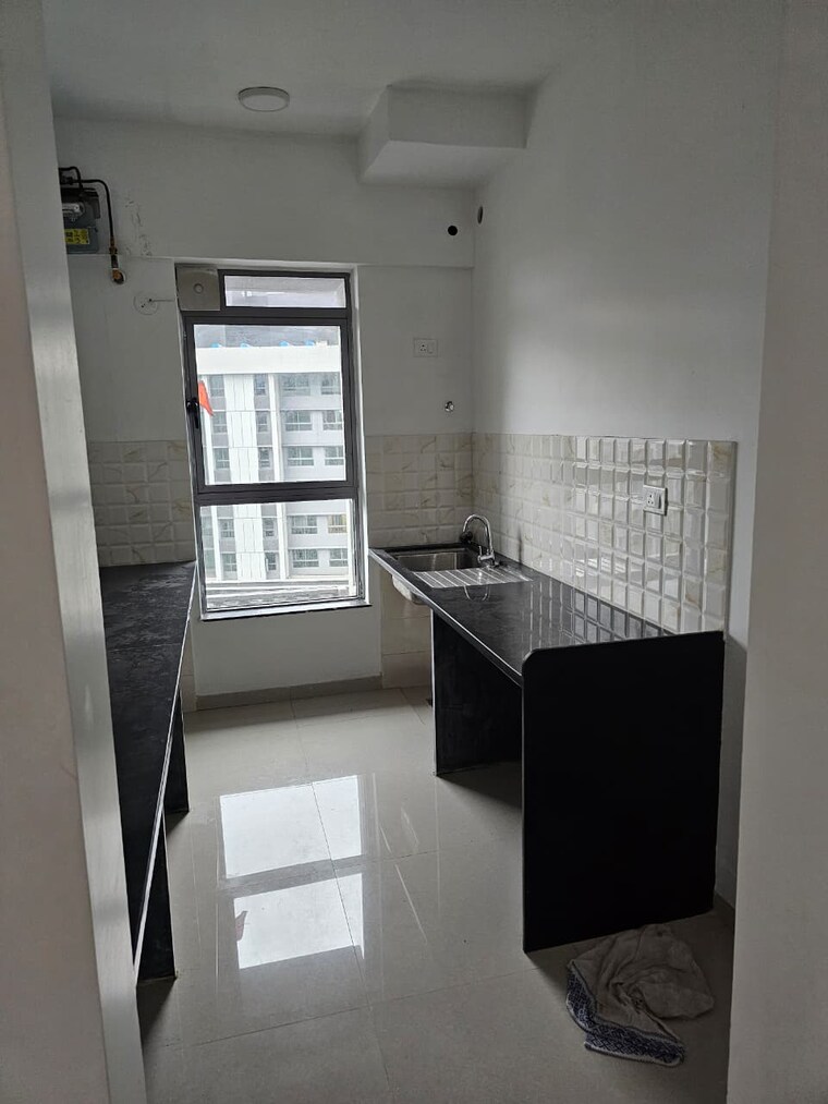 Kitchen, kalpataru-immensa 2 Bedroom 637 Sq.Ft. Apartment In Kolshet Road Thane 9180526
