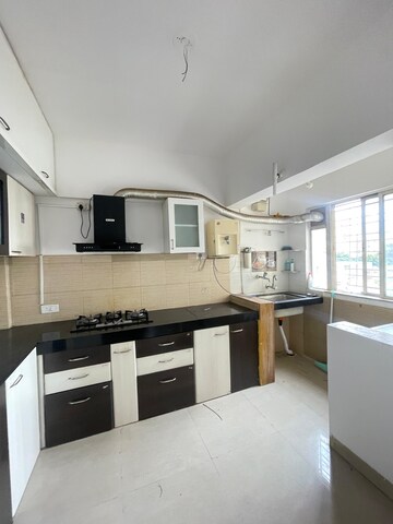 Kitchen in 2 BHK Apartment at Pride Aashiyana, Dhanori – for Rent