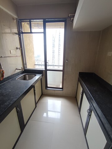 Kitchen in 2 BHK Apartment at Ajmera Yogi Dham Phase III, Kalyan West – for Rent