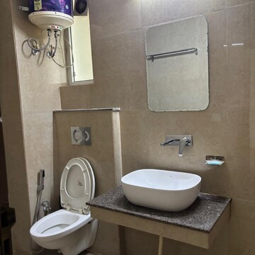 Bathroom in 3 BHK Apartment at Artique Uptown Skylla, International Airport Road – for Rent