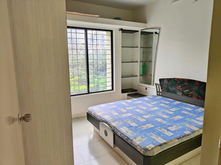 Bedroom, radhakrishna-township 2 Bedroom 815 Sq.Ft. Apartment In Sinhagad Road Pune 9180618