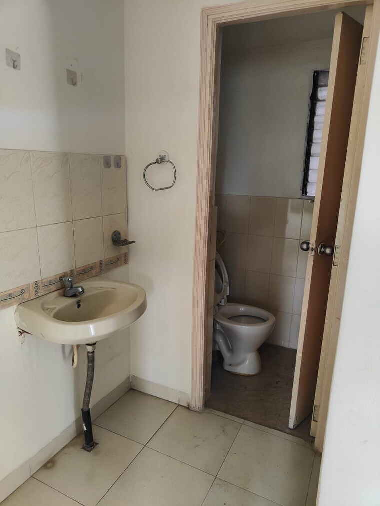 Bathroom, radhakrishna-township 2 Bedroom 815 Sq.Ft. Apartment In Sinhagad Road Pune 9180618