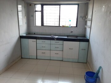 Kitchen in 2 BHK Apartment at Radhakrishna Township, Sinhagad Road – for Rent