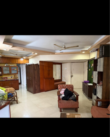 Living Room in 2 BHK Apartment at Shivam CHS Goregaon East, Umershetpada – for Rent