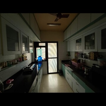 Kitchen in 2 BHK Apartment at Shivam CHS Goregaon East, Umershetpada – for Rent