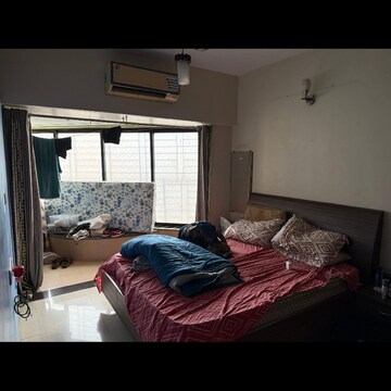 Bedroom in 2 BHK Apartment at Shivam CHS Goregaon East, Umershetpada – for Rent