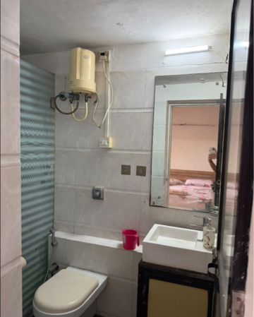 Bathroom in 2 BHK Apartment at Shivam CHS Goregaon East, Umershetpada – for Rent