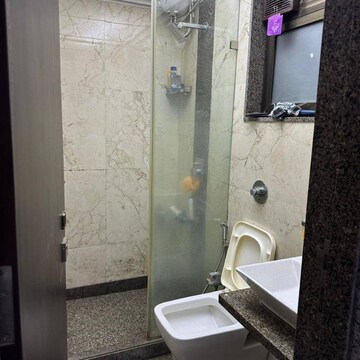 Bathroom in 2 BHK Apartment at Tulip CHS Andheri West, Mhada Colony – for Rent