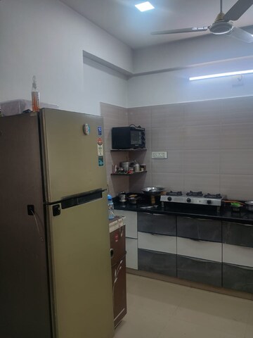 Kitchen in 2 BHK Apartment at Sahaj Solarium, Vasna – for Rent