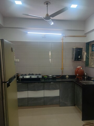 Kitchen in 2 BHK Apartment at Sahaj Solarium, Vasna – for Rent