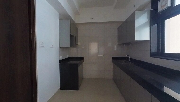 Kitchen, celestia-spaces 2 Bedroom 840 Sq.Ft. Apartment In Parel Mumbai 9180836