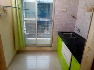 Kitchen in 1 BHK Apartment at Ravechi Narayan Residency, Taloja – for Sale