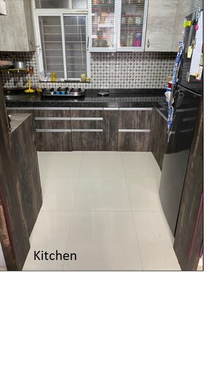 Kitchen in 2 BHK Apartment at Nirman Altius, Kharadi – for Rent