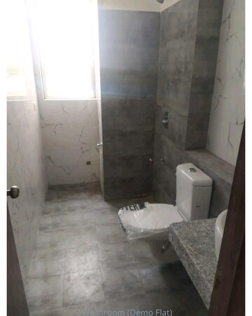 Bathroom in 3 BHK Apartment at Umang Winter Hills, Sector 77 – for Sale