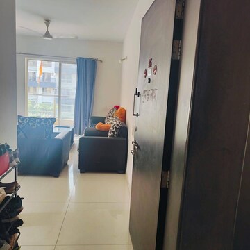 Living Room in 1 BHK Apartment at Kolte Patil Downtown Xenia, Kharadi – for Rent