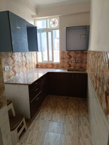 Kitchen in 2 BHK Apartment at Gaur City 2 - 10th Avenue, Sector 16c Greater Noida – for Rent