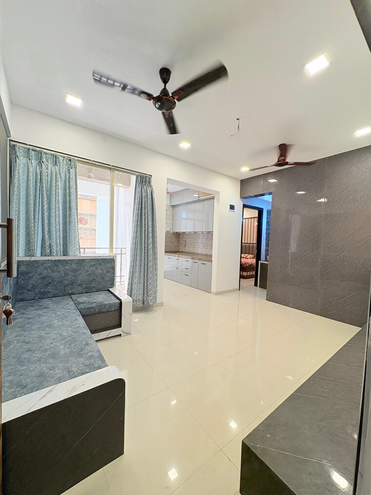 Living Room, deeplaxmi-shreeji-meadows 2 Bedroom 905 Sq.Ft. Apartment In Katrap Thane 9181466