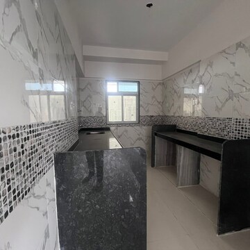 Kitchen in 2 BHK Apartment at DGS Sheetal Tapovan, Malad East – for Rent