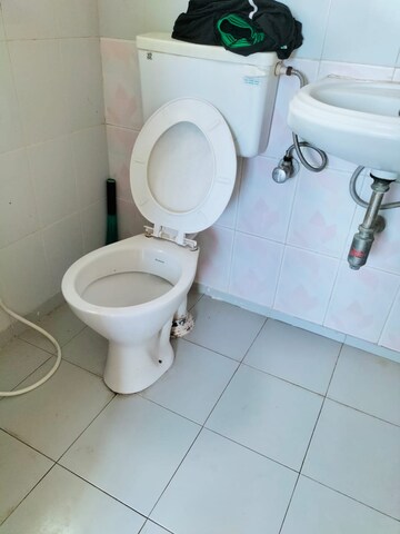 Bathroom in 2 BHK Apartment at Nagari Niwara CHS, Goregaon East – for Rent
