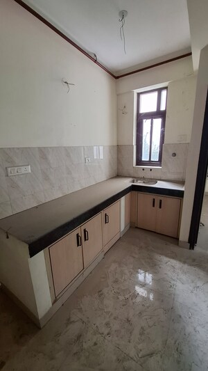 Kitchen in 1.5 BHK Apartment at Sector 12 Greater Noida – for Sale