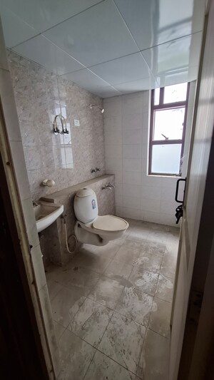 Bathroom in 1.5 BHK Apartment at Sector 12 Greater Noida – for Sale