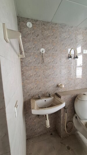 Bathroom in 1.5 BHK Apartment at Sector 12 Greater Noida – for Sale