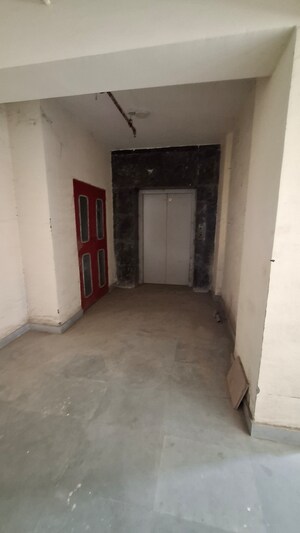 Building Lobby in 1.5 BHK Apartment at Sector 12 Greater Noida – for Sale