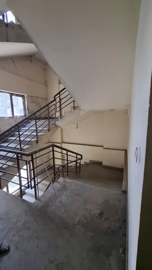 Staircase in 1.5 BHK Apartment at Sector 12 Greater Noida – for Sale