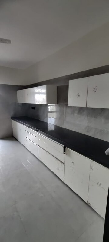 Kitchen in 4 BHK Apartment at Zindagi CHS, Khar West – for Rent