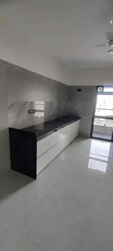 Kitchen in 4 BHK Apartment at Zindagi CHS, Khar West – for Rent