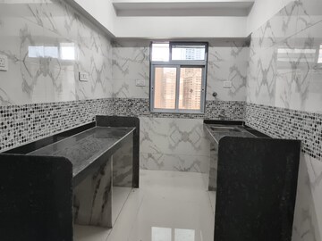 Kitchen in 1 BHK Apartment at DGS Sheetal Tapovan, Malad East – for Sale
