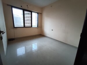 Room in 1 BHK Apartment at Ajmera Yogi Dham Phase III, Kalyan West – for Sale