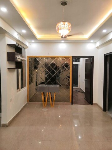 Living Room in 2 BHK Apartment at Galaxy North Avenue ll, Gaur City 2 – for Sale