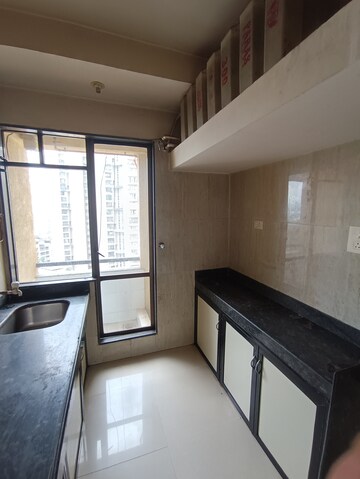 Kitchen in 2 BHK Apartment at Ajmera Yogi Dham Phase III, Kalyan West – for Sale
