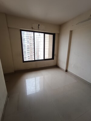 Room in 2 BHK Apartment at Ajmera Yogi Dham Phase III, Kalyan West – for Sale