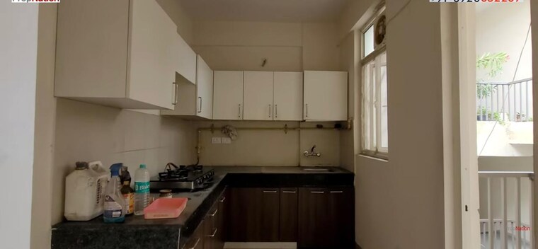 Kitchen, wave-executive-floors 2 Bedroom 900 Sq.Ft. Apartment In Wave City Ghaziabad 9182141